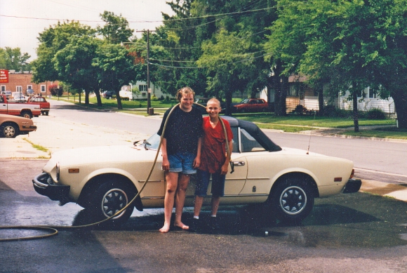 Meg and Jer washing a car