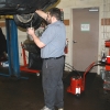 A Motor Works Technician performs a brake fluid service (flush) on a Lexus